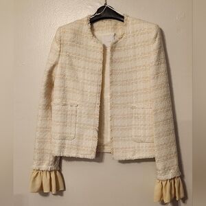 Tweed jacket with ruffles cuffs